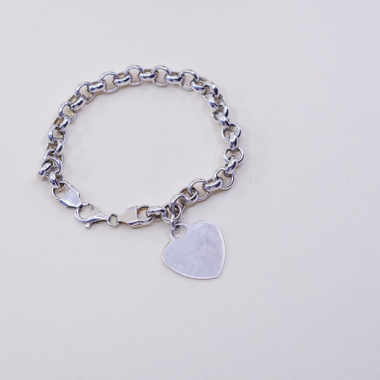 7.25" vtg Italy sterling silver circle bracelet, bold circle chain heart charm