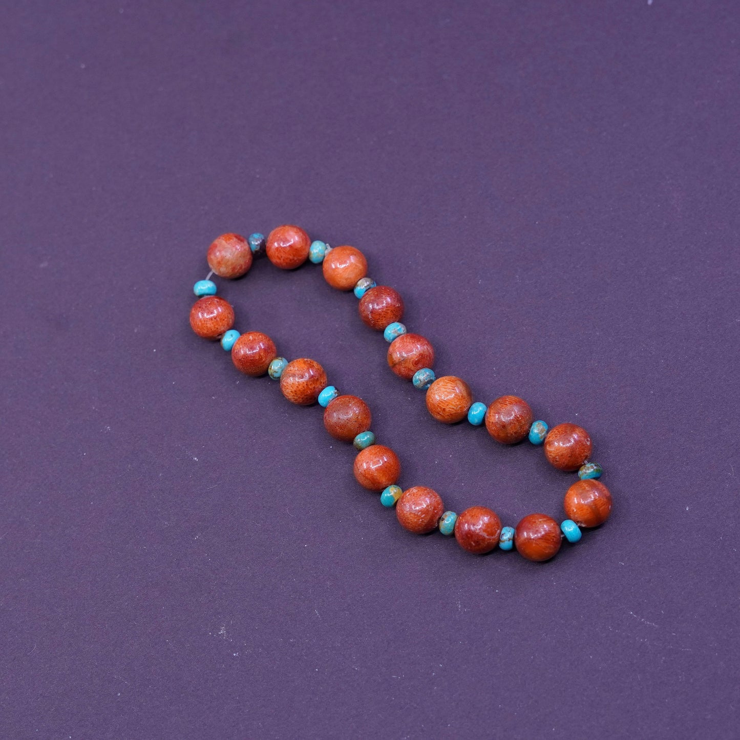 6.75”, vtg handmade bracelet, elastic band with red coral and turquoise beads