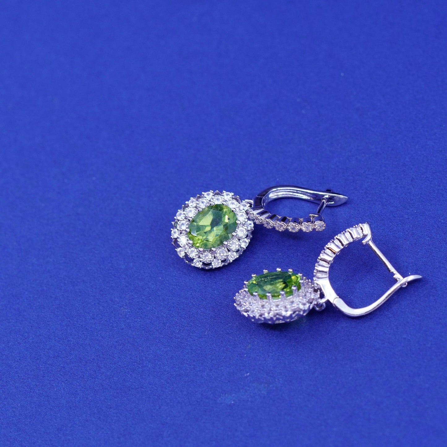 Vintage sterling 925 silver handmade huggie earrings with peridot and cz around
