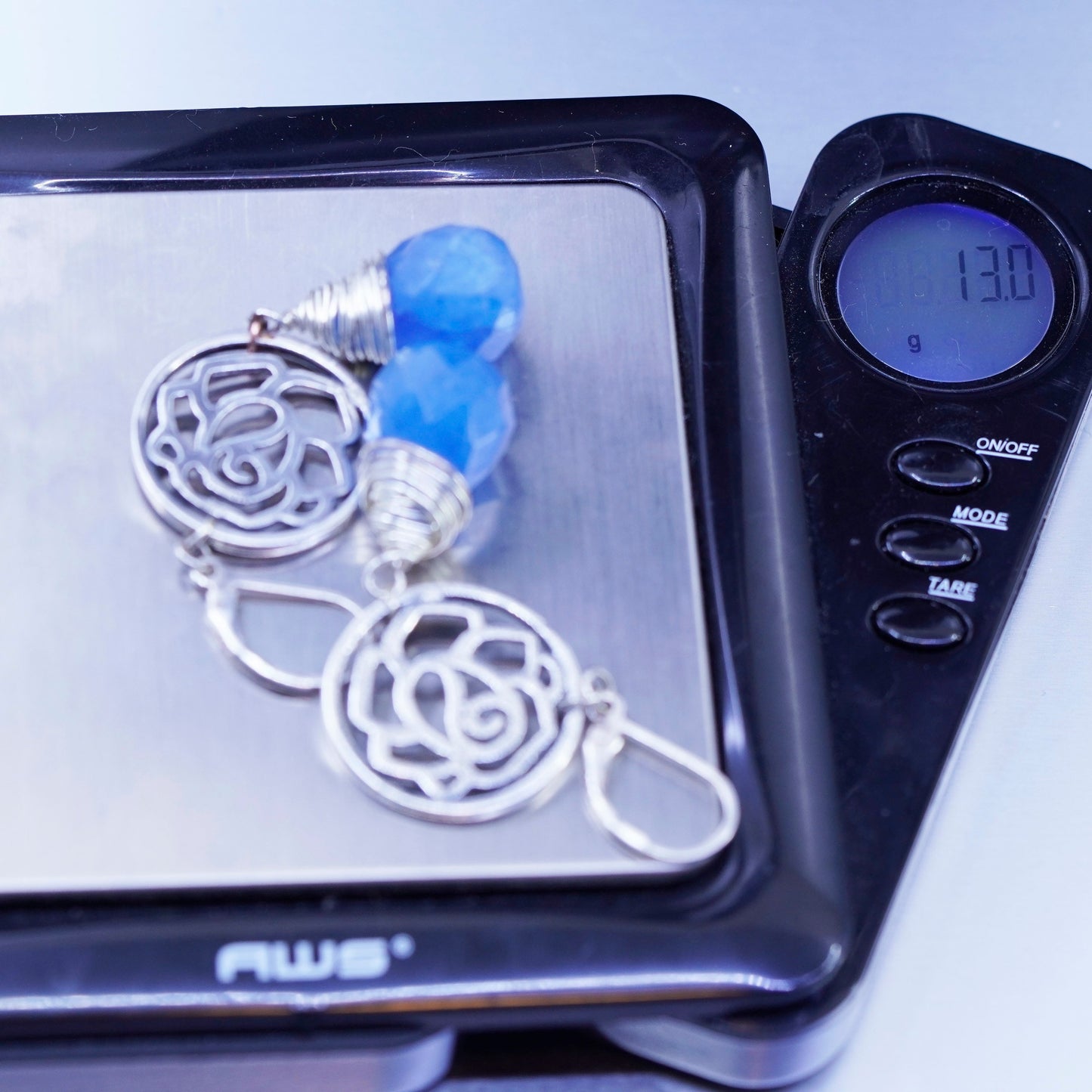 Sterling 925 silver handmade flower earrings with teardrop blue Grandidierite