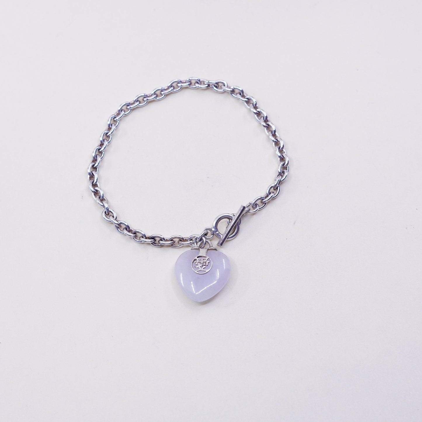 6.75”, sterling 925 silver circle bracelet w/ heart jade charm and “love”