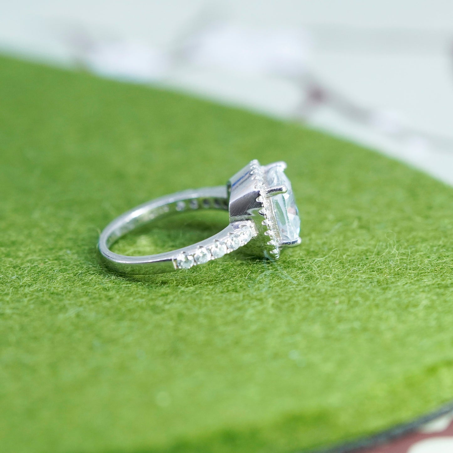 Size 6, Sterling 925 silver engagement ring with emerald cut CZ and cluster cz