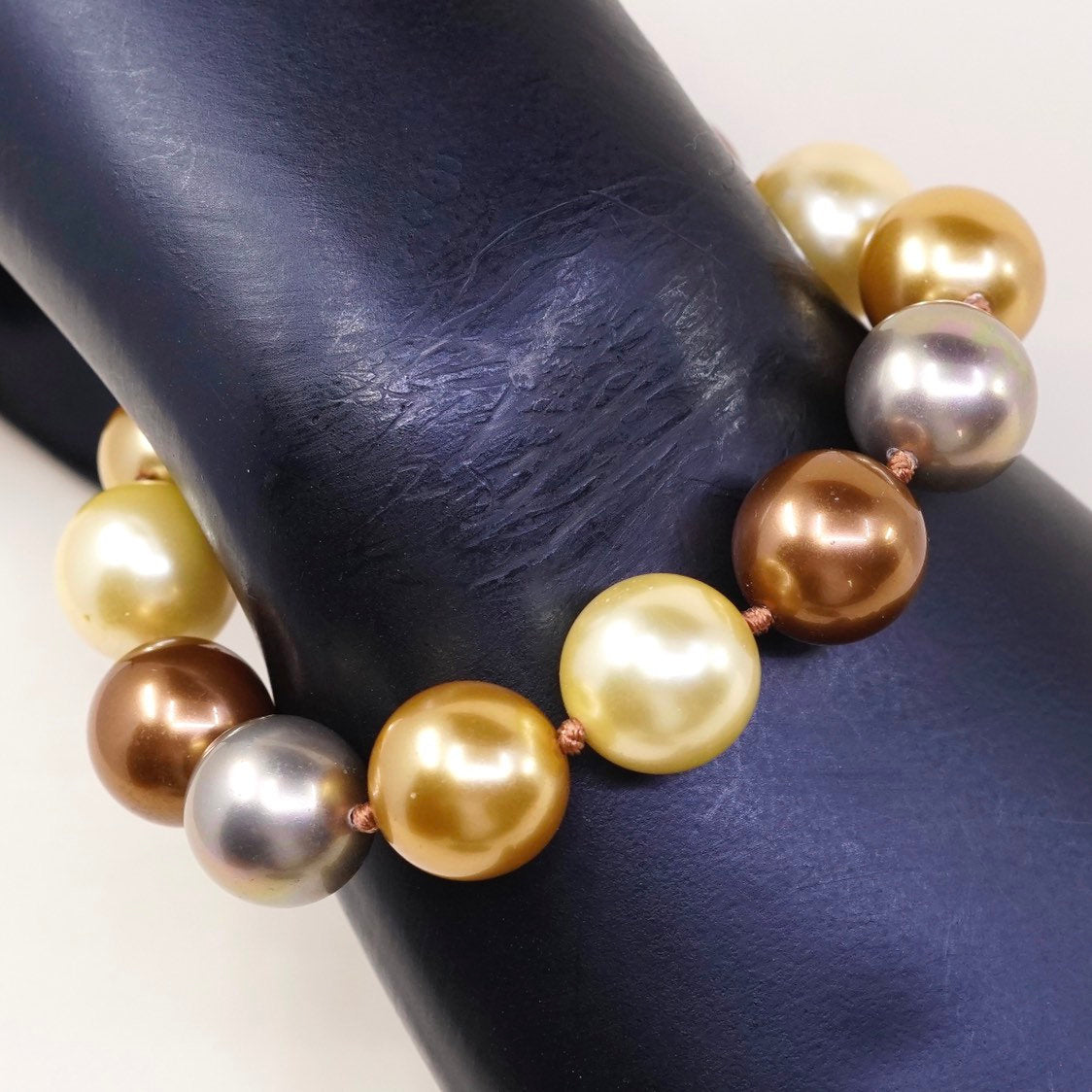 6.5”, Vintage handmade bracelet, gold and earth tone pearl beads w/ 925 clasp