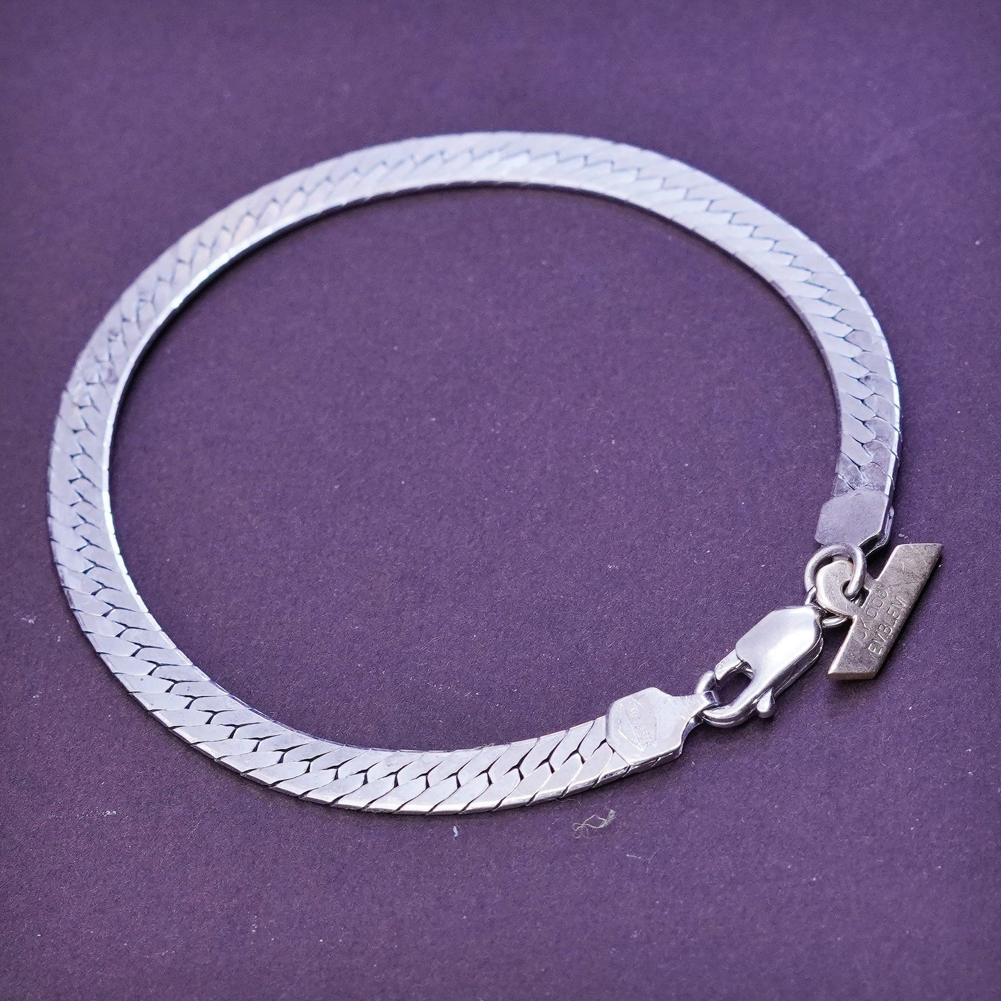 7”, Sterling silver herringbone bracelet, Italy 925 chain 10K gold Demco charm