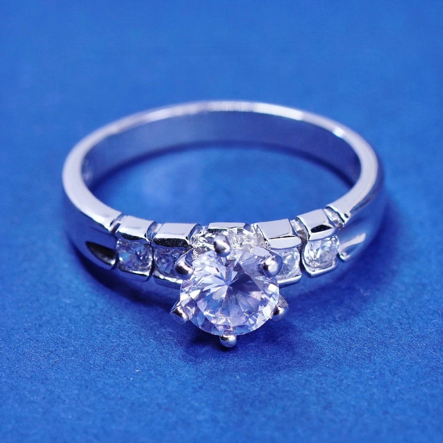 Size 7.25, vintage Sterling 925 silver engagement ring with clear cz stones