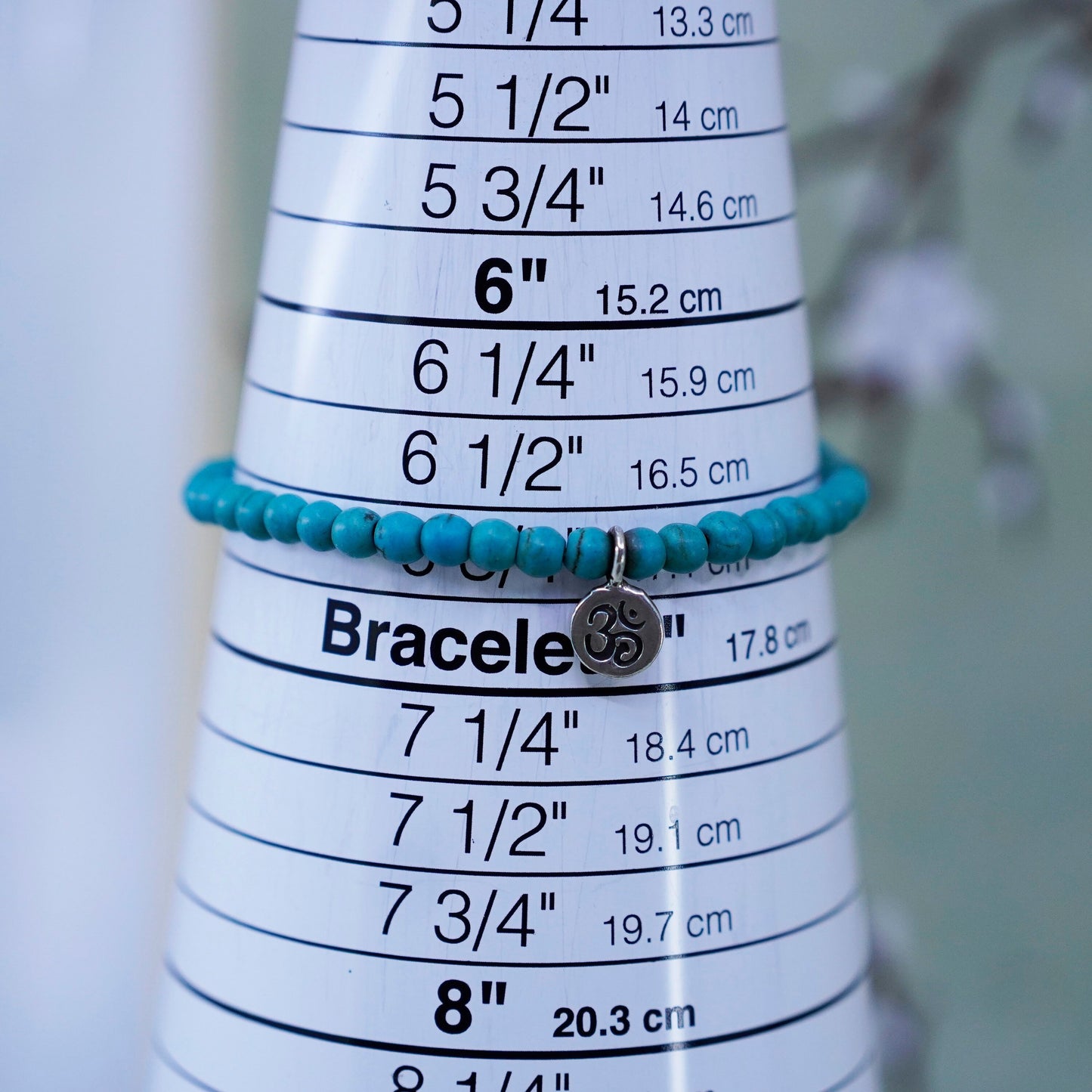 6.75”, handmade bracelet turquoise beads elastic band sterling 925 silver charm