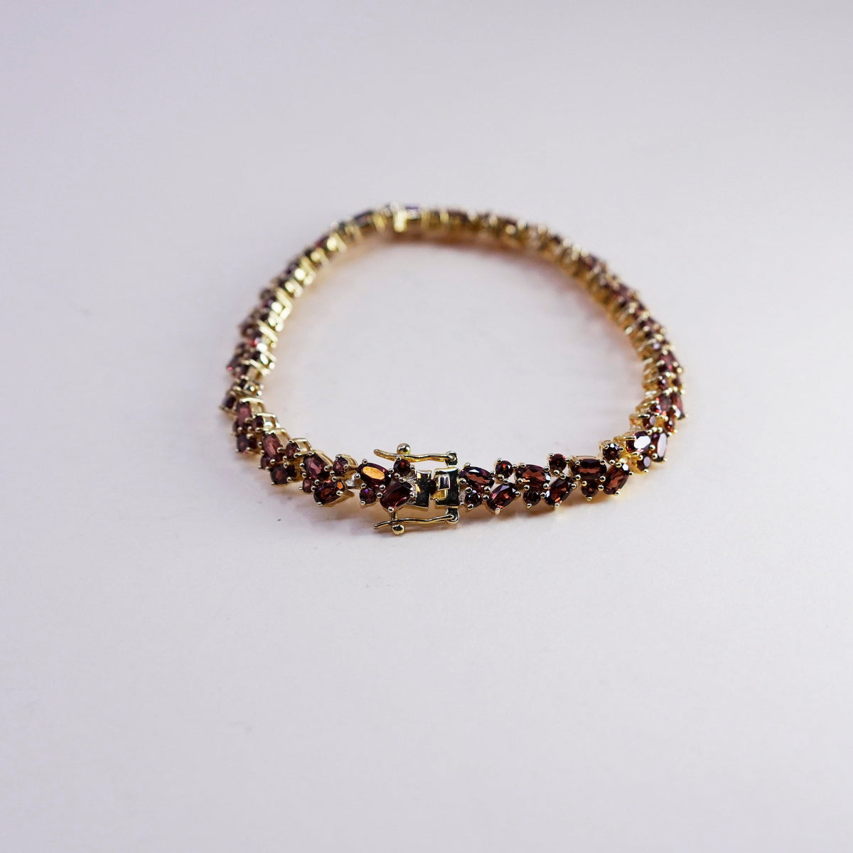 7.5”, vermeil gold over Sterling 925 silver tennis bracelet with cluster ruby