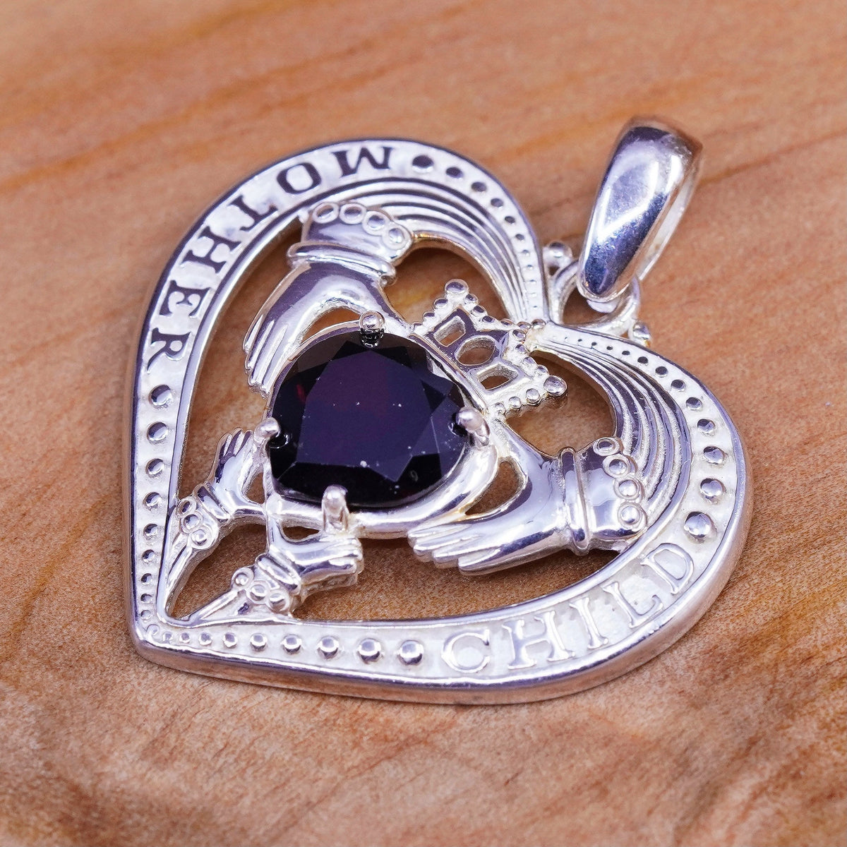 Vintage Ireland sterling silver claddagh pendant, holding heart 925 charm ruby