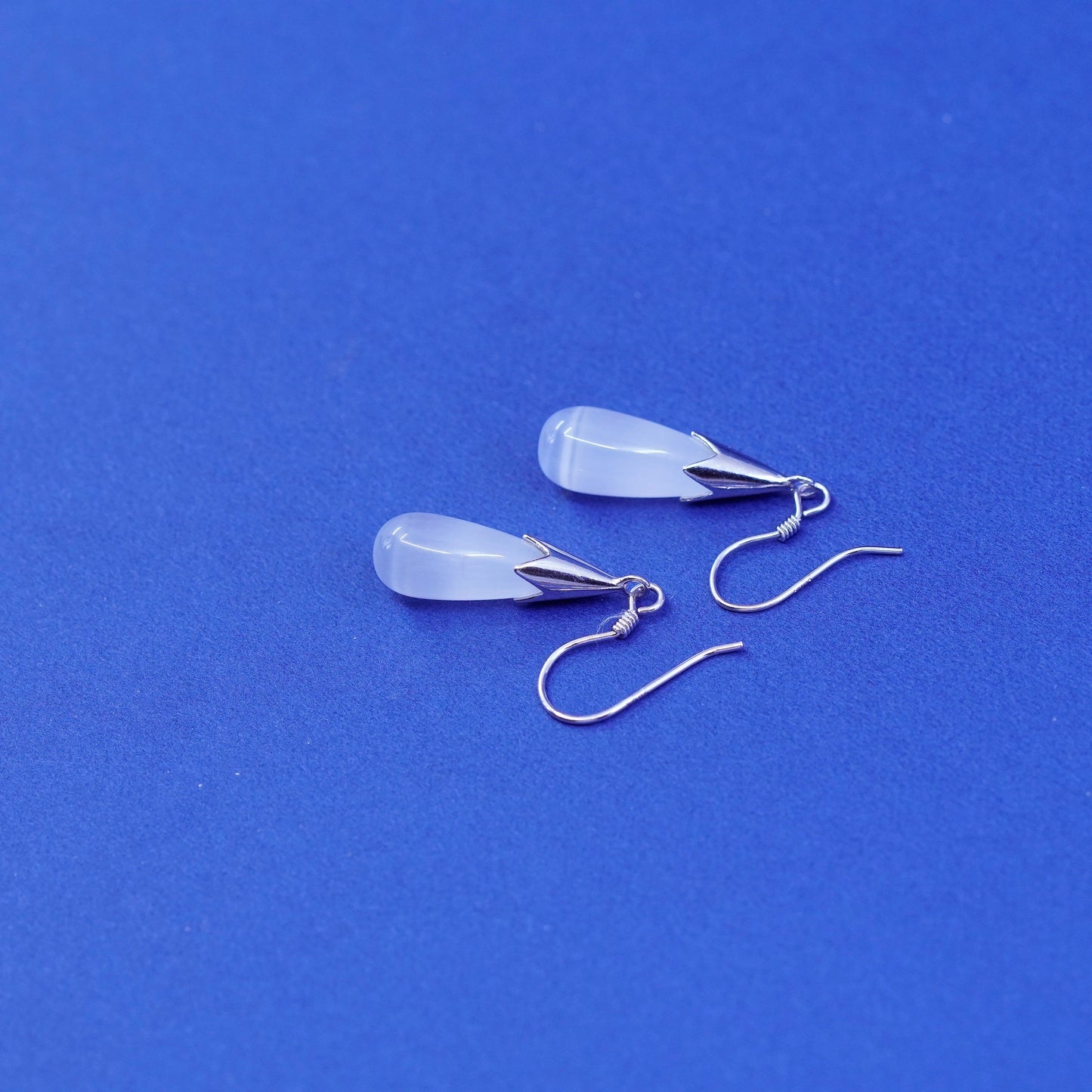 1.25”, Vintage sterling 925 silver handmade earrings w/ teardrop white cats eye