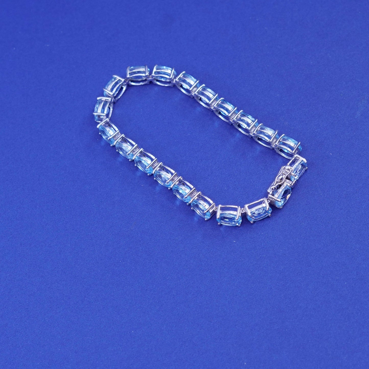7.25”, vintage Sterling 925 silver tennis bracelet with topaz
