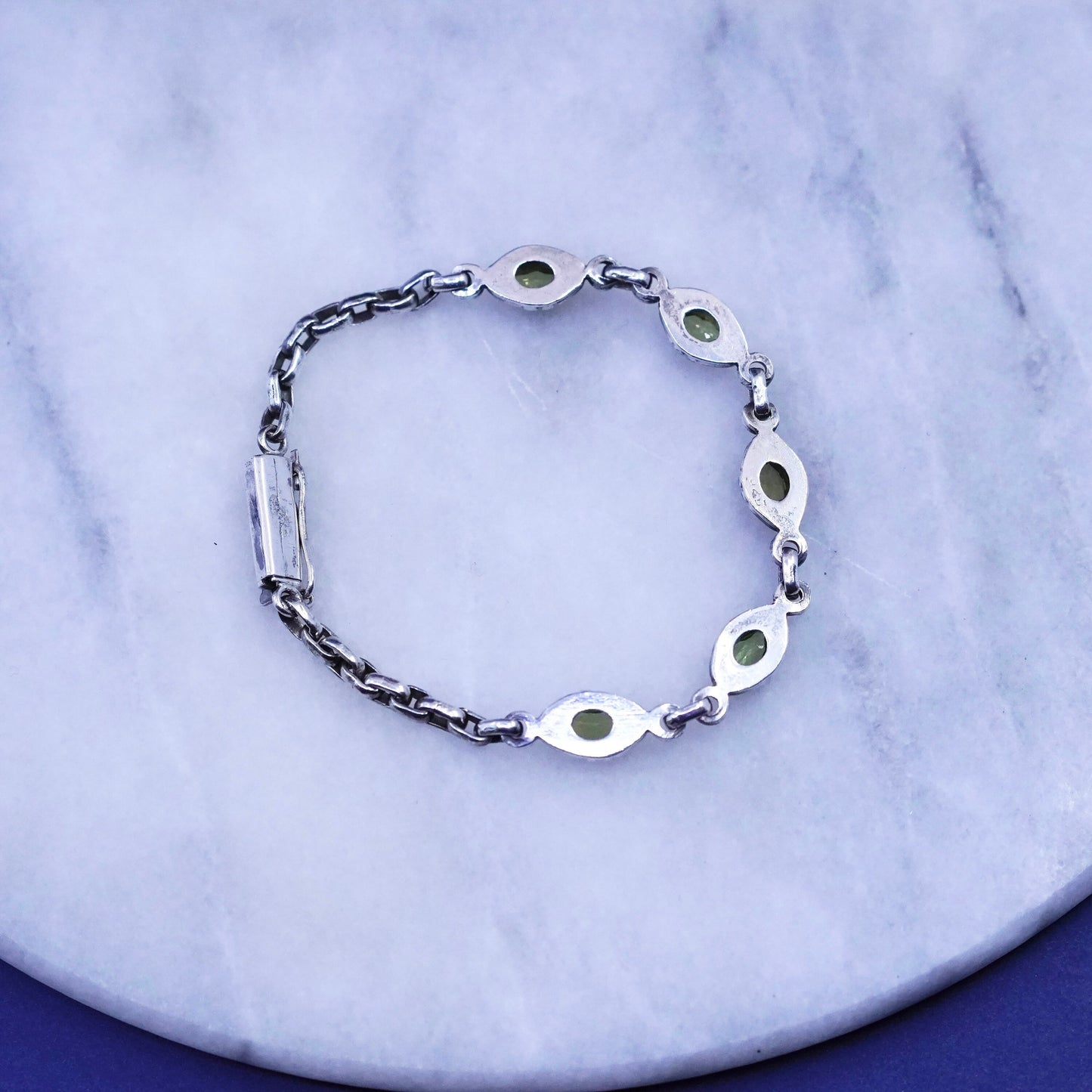 7”, vintage Sterling 925 silver tennis bracelet with marquise shaped peridot