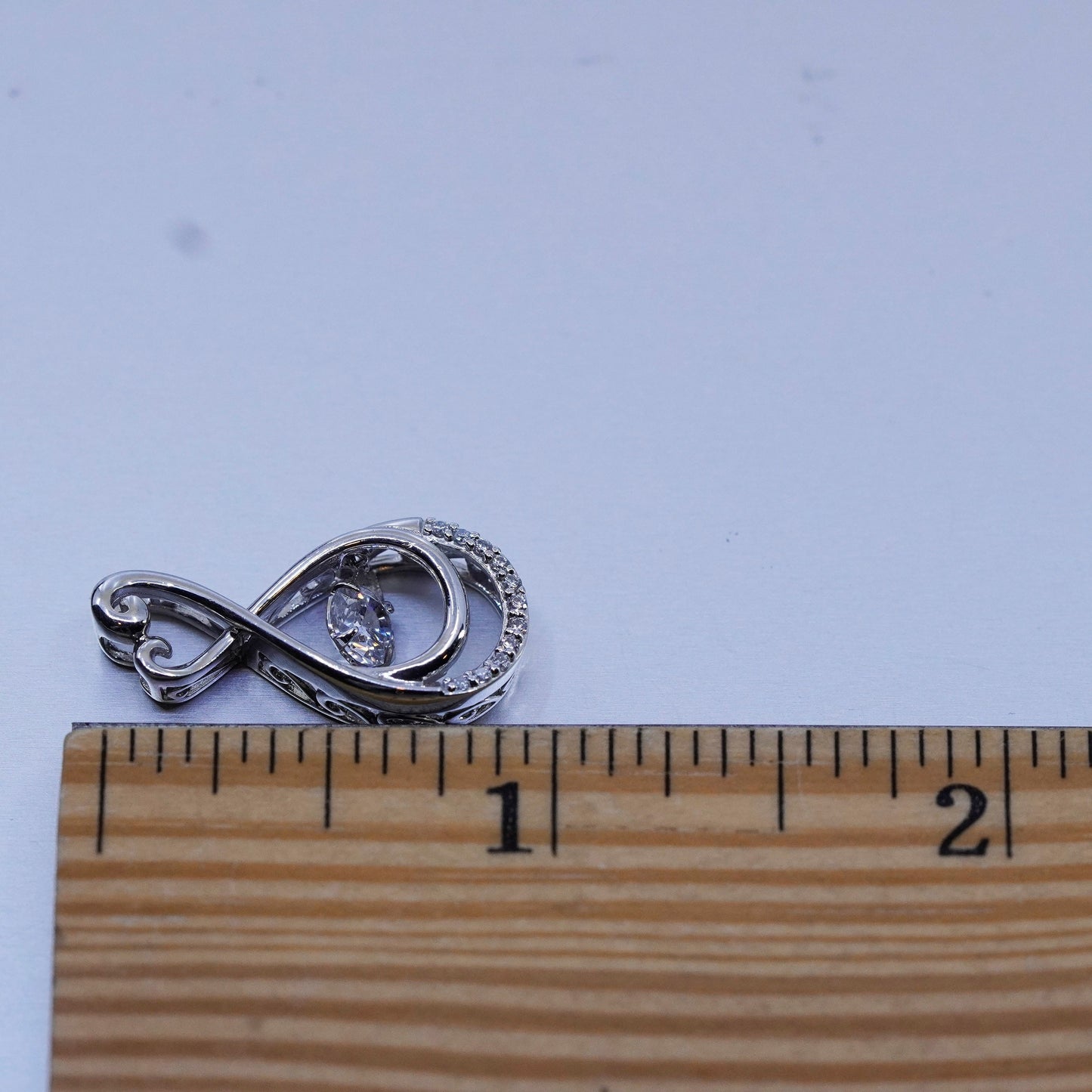 Vintage sterling 925 silver heart pendant with dancing charm Cz