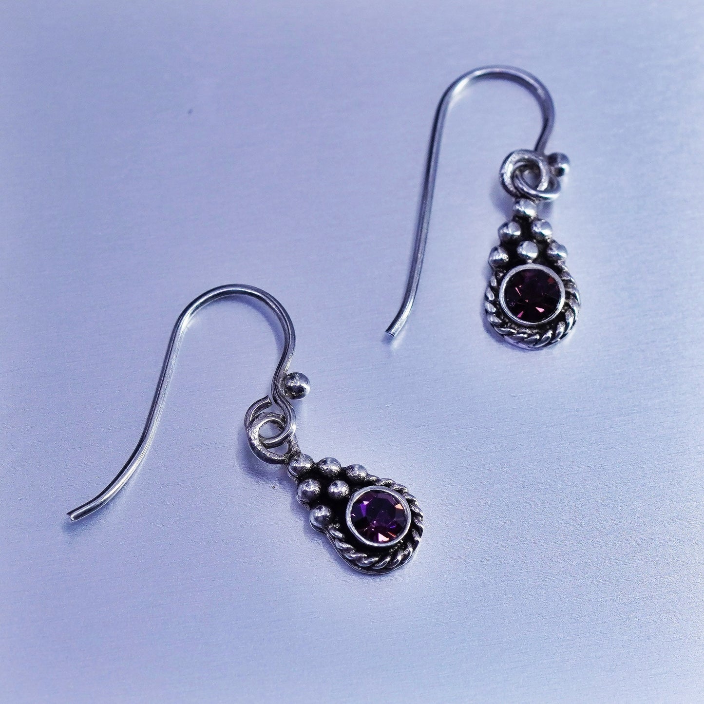 Vintage Sterling 925 silver earrings with purple crystal and cable around