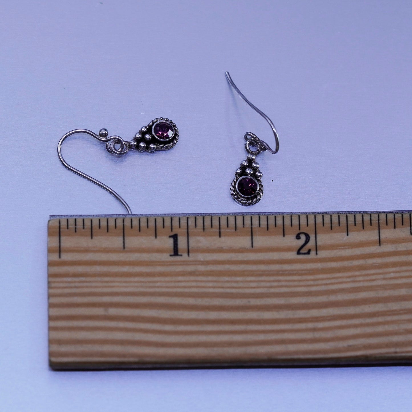 Vintage Sterling 925 silver earrings with purple crystal and cable around