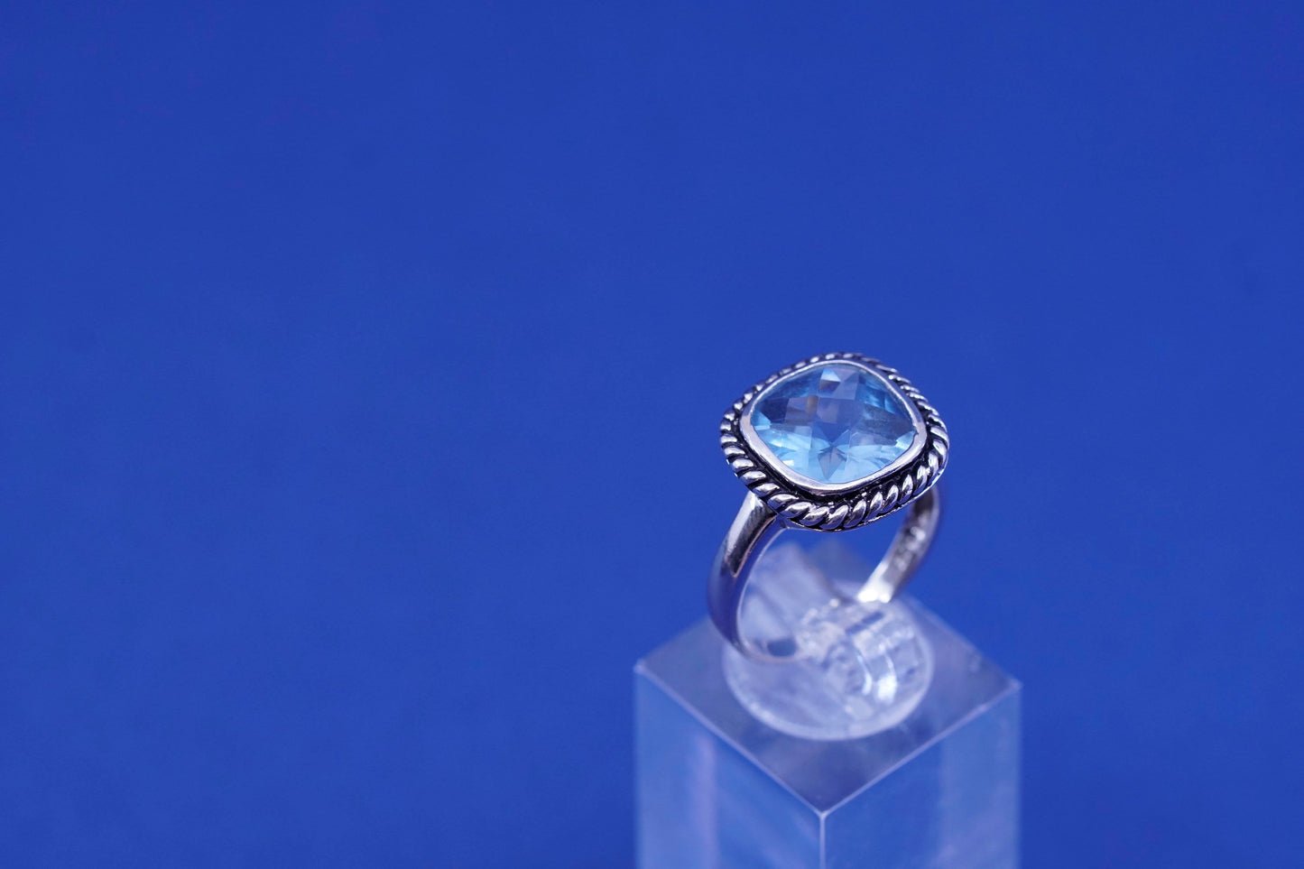 Size 7.75, vintage sterling 925 silver handmade ring with blue topaz and cable