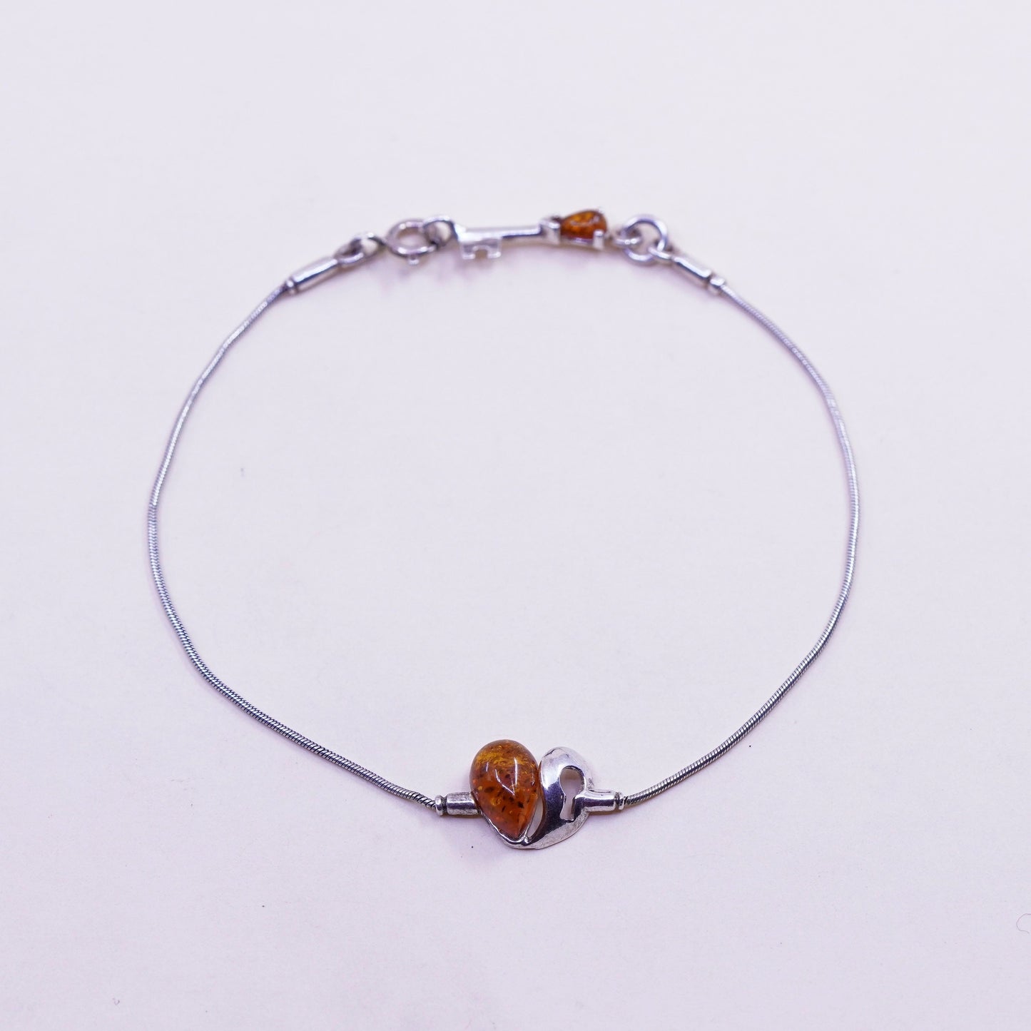 7.25”, Vintage sterling 925 silver handmade bracelet with amber heart and key