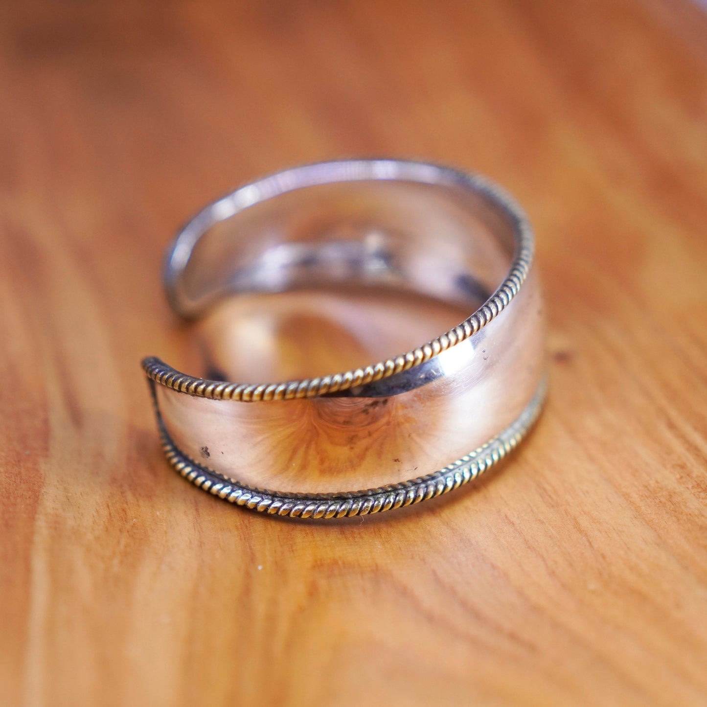 6.5”, vtg two tone Sterling silver bracelet, southwestern 925 cuff brass cable