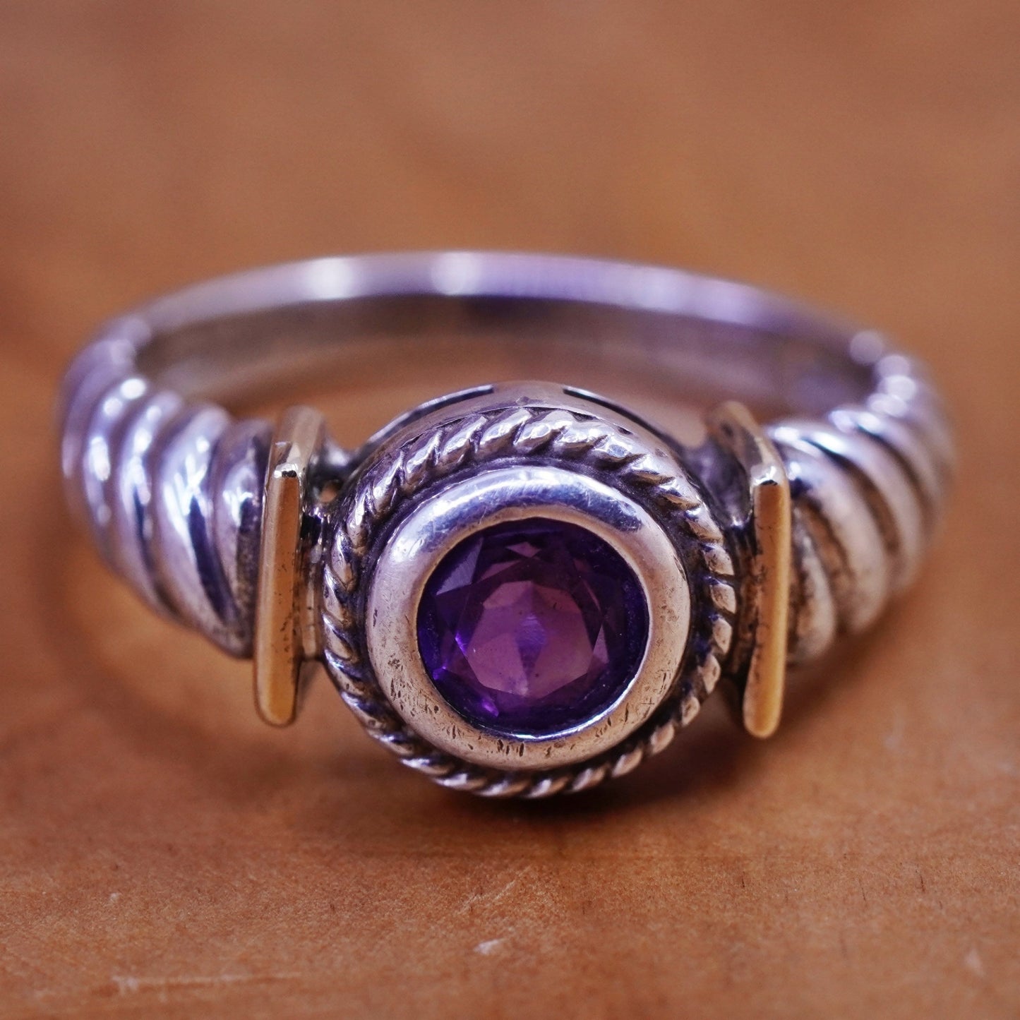Size 8.25, 14K yellow gold with Sterling silver ring, 925 band with amethyst