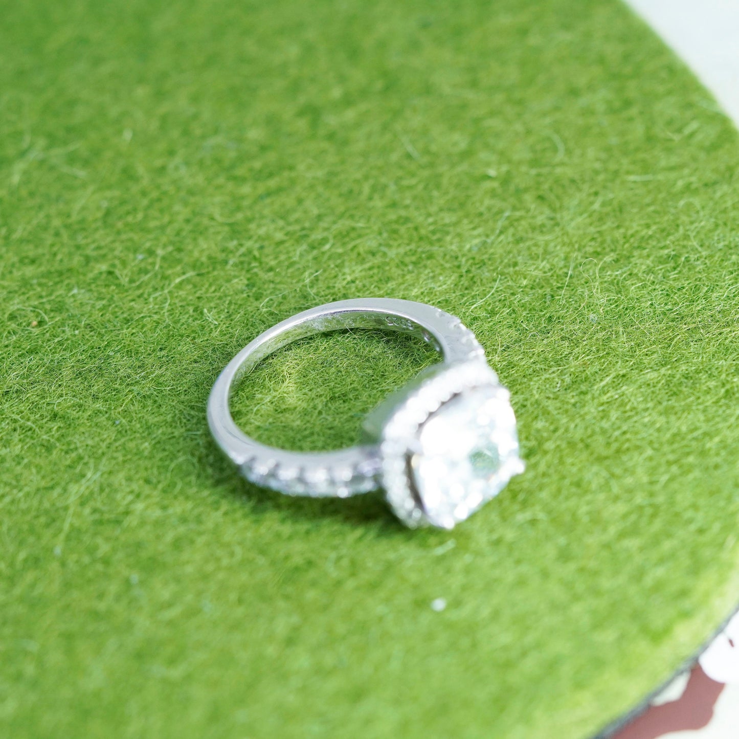 Size 6, Sterling 925 silver engagement ring with emerald cut CZ and cluster cz