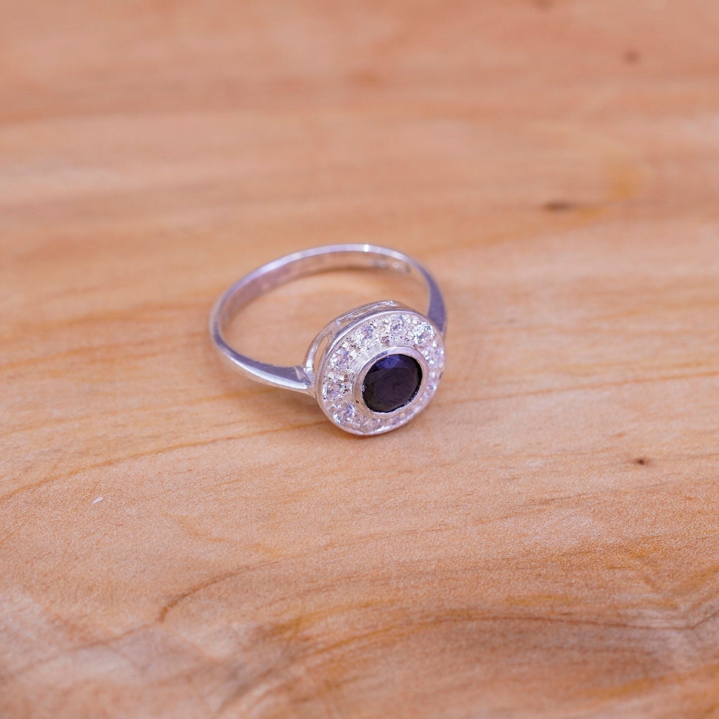 Size 8, Sterling 925 silver shiny engagement ring with sapphire and Cz around
