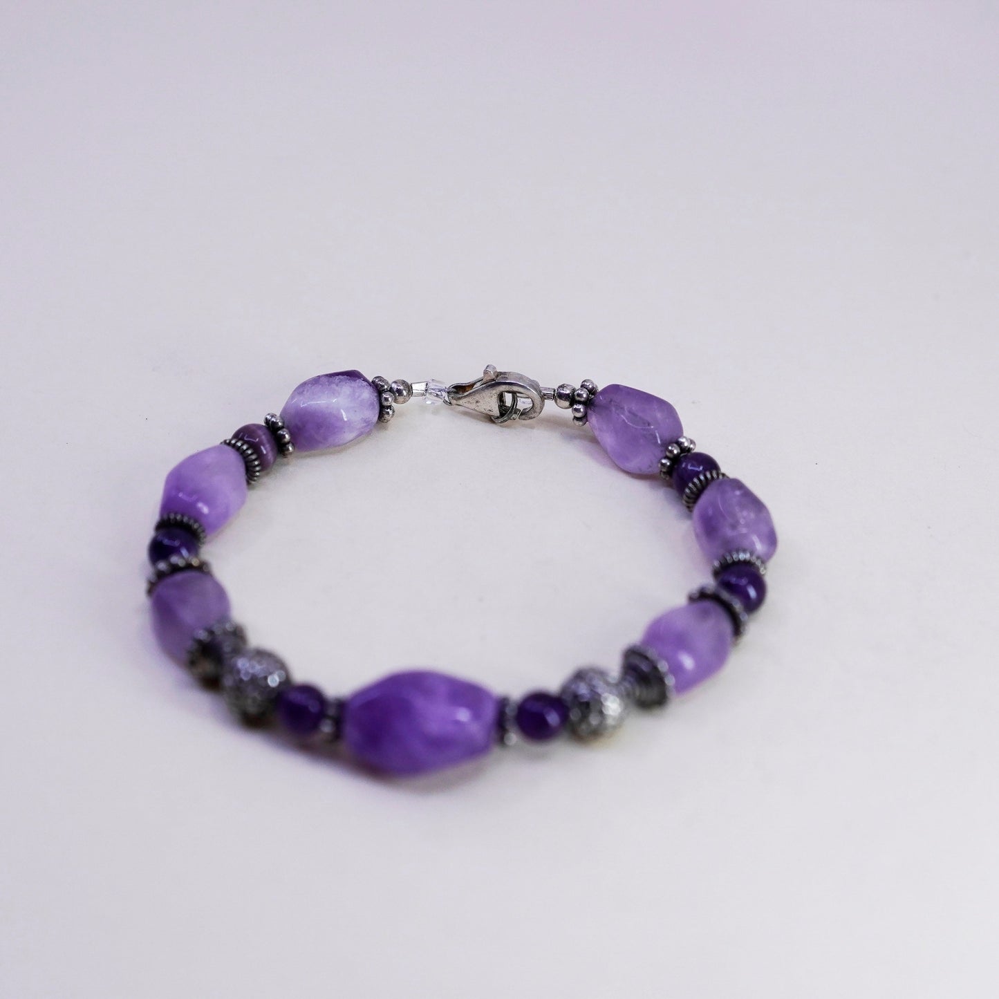 7.25” Sterling silver handmade bracelet, amethyst nuggets tiger eye beads