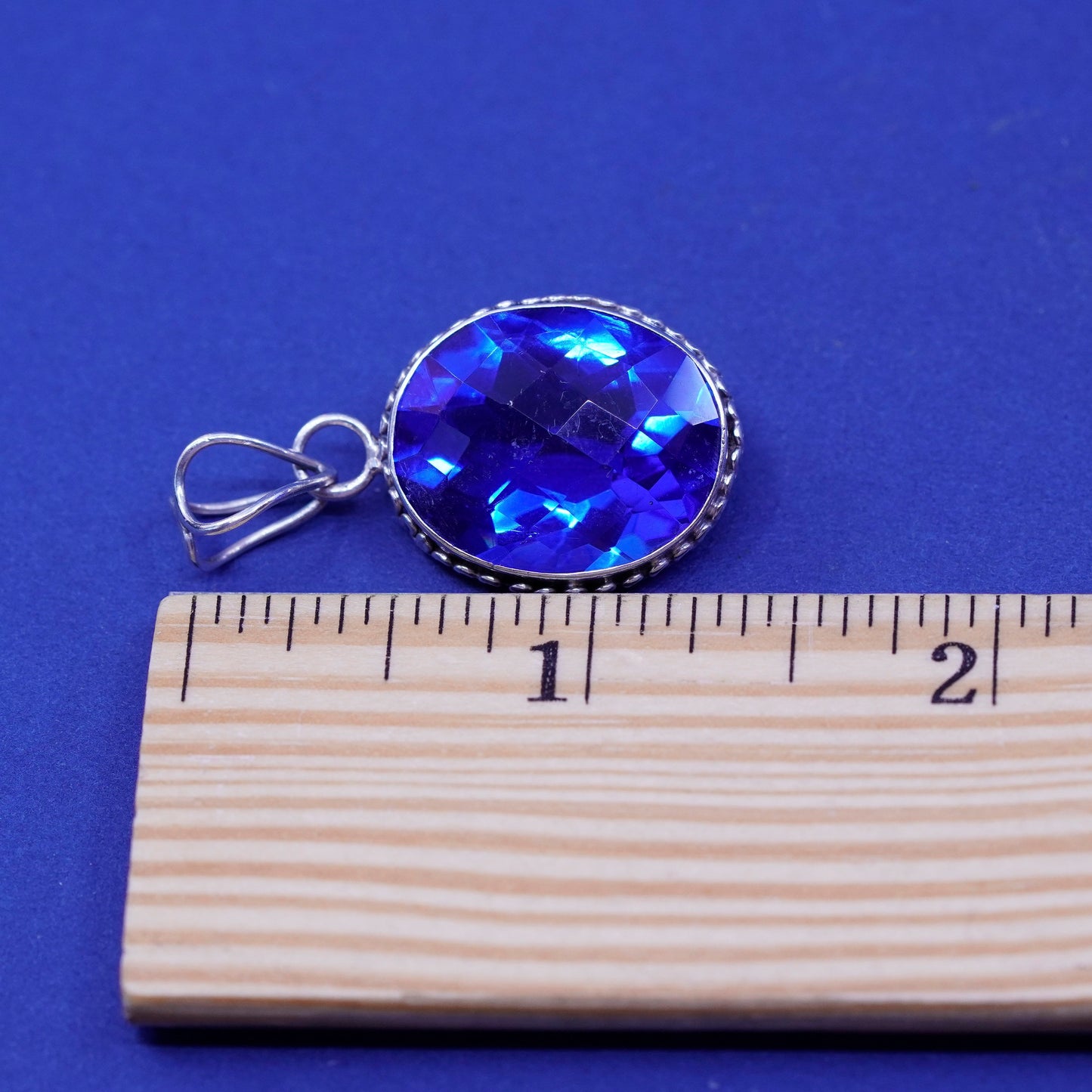 Vintage sterling 925 silver handmade pendant with blue topaz