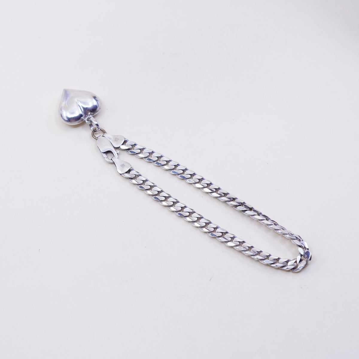 7.75”, sterling silver flatten curb bracelet, bold 925 chain with heart charm