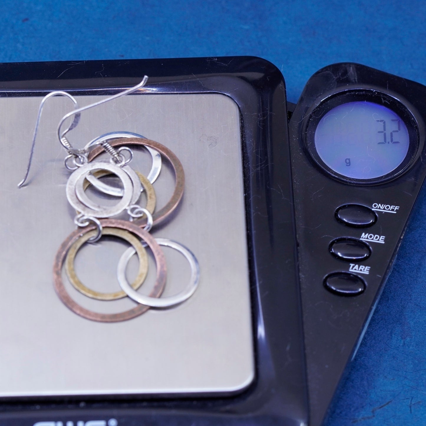 Vintage Sterling Silver handmade Earrings. 925 entwined flatten circle dangles