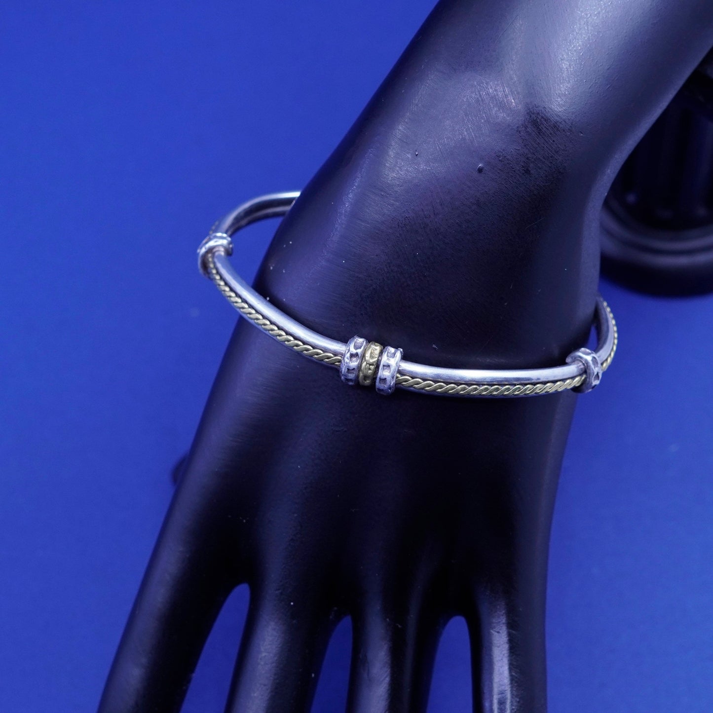 7.25”, two tone Sterling silver bracelet, ribbed 925 cuff with brass cable