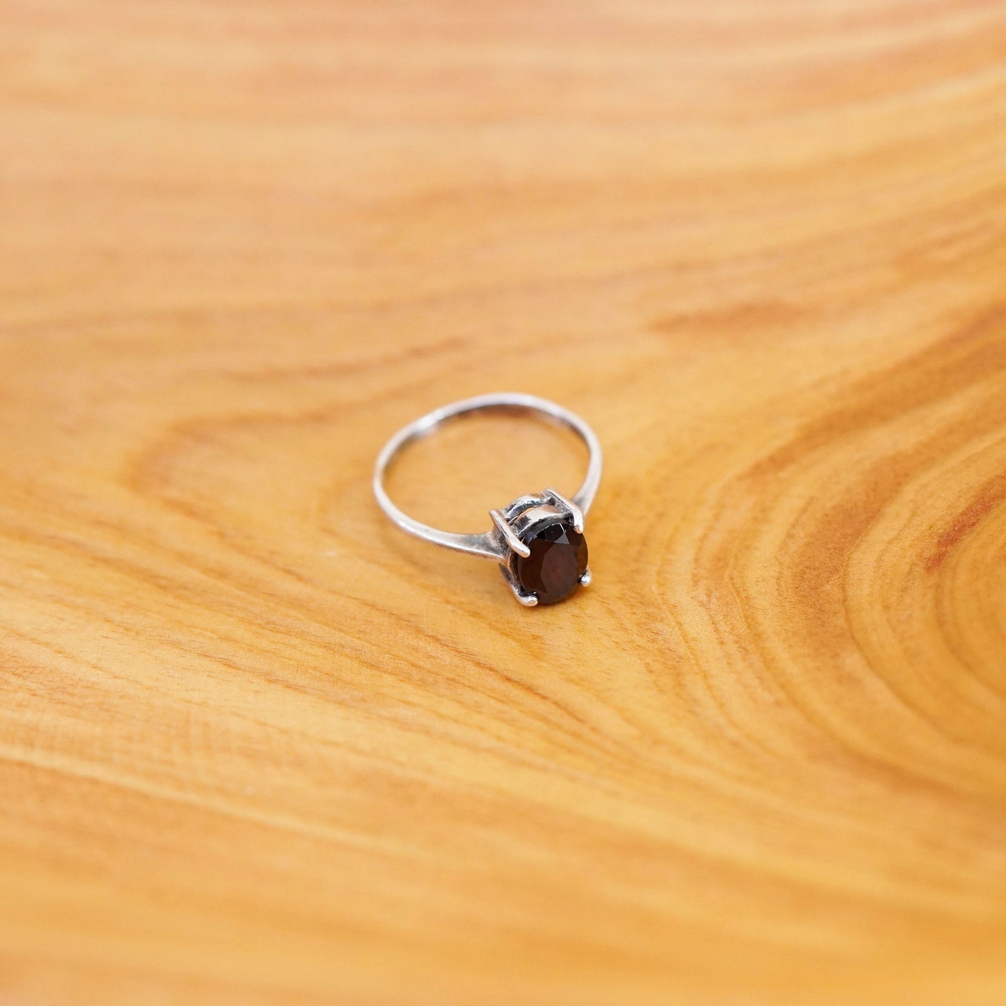Size 6, size adjustable. vintage Sterling 925 stackable ring with oval garnet
