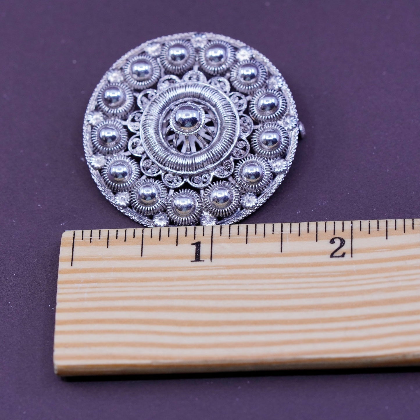 Vintage handmade sterling silver round shaped filigree bead brooch