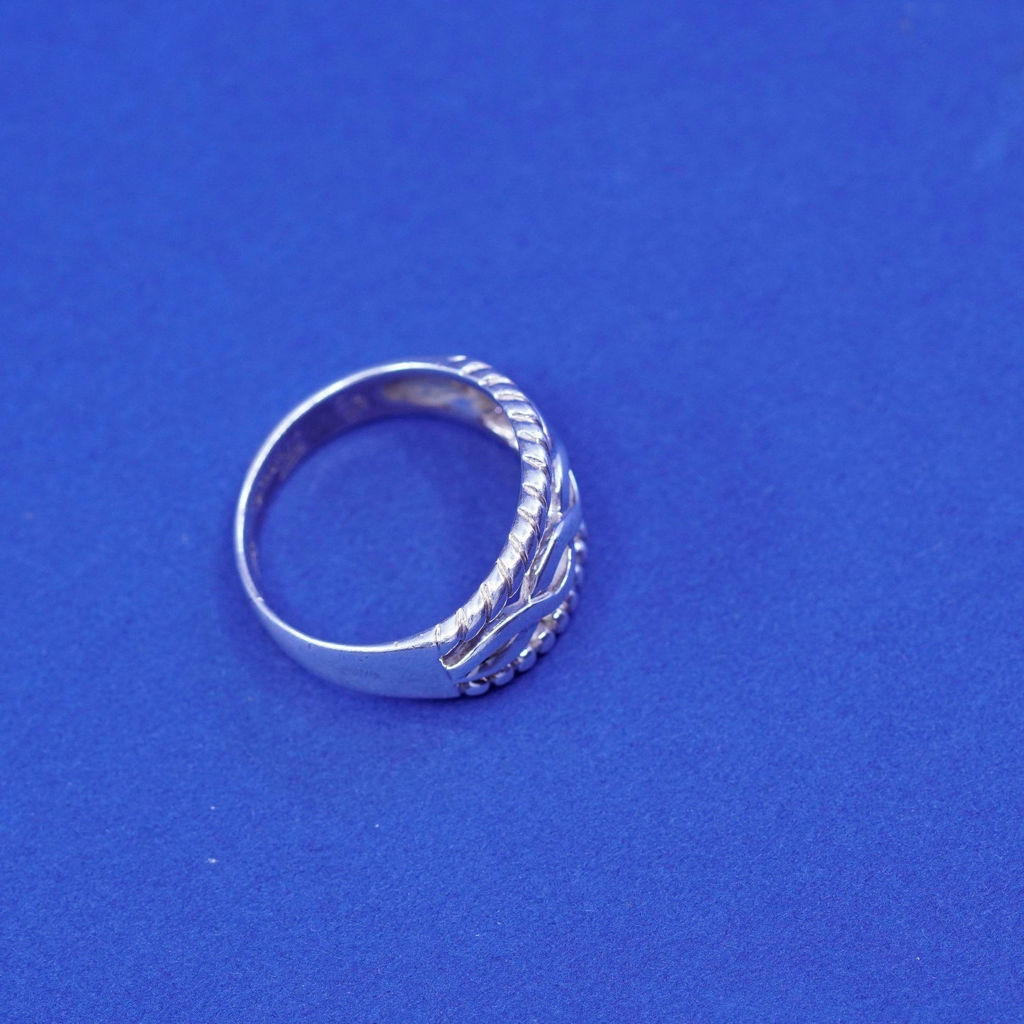 Size 8.25, Sterling silver ring, 925 cable band embossed “friends forever”