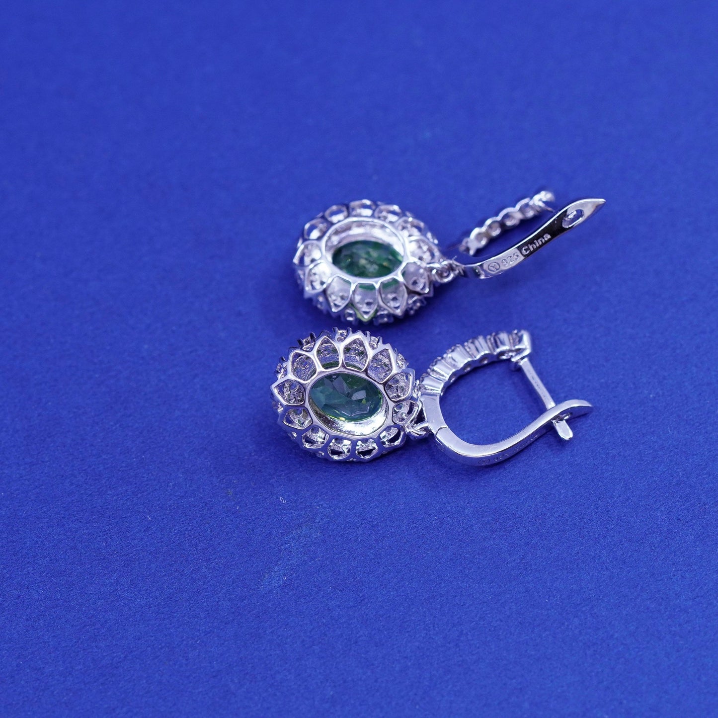 Vintage sterling 925 silver handmade huggie earrings with peridot and cz around