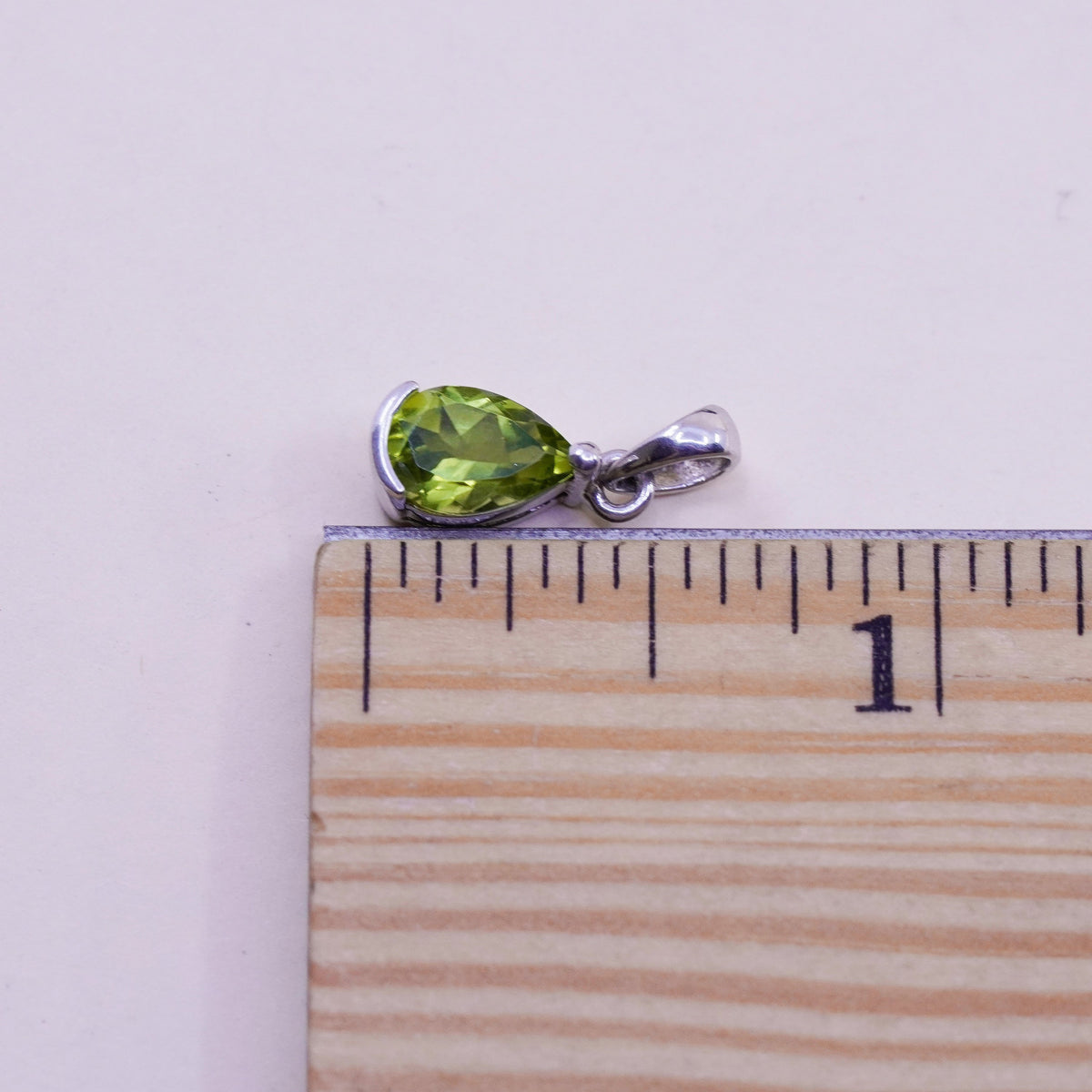 Vintage handmade Sterling 925 silver angel pendant with teardrop peridot