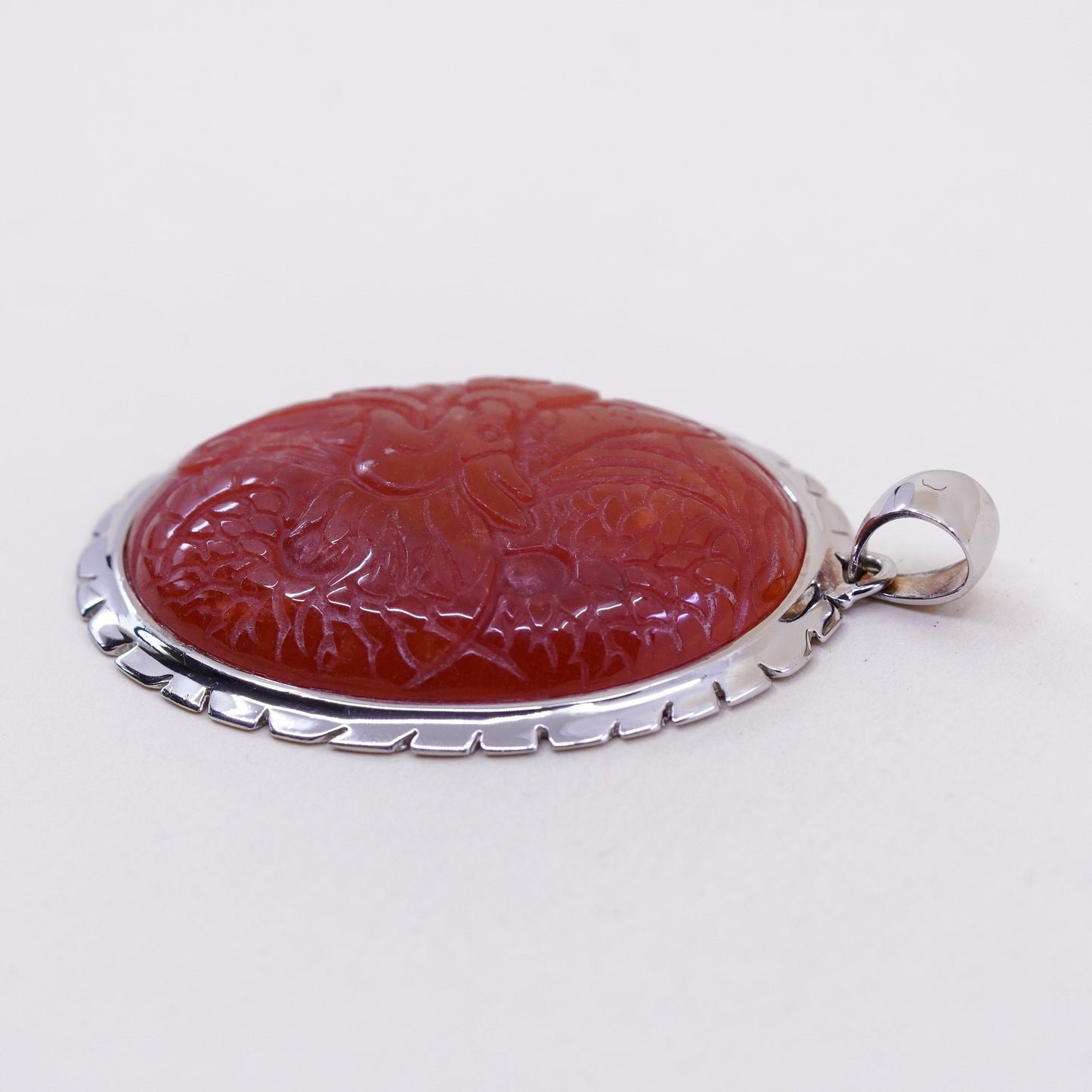 Vintage sterling 925 silver handmade pendant with carved carnelian