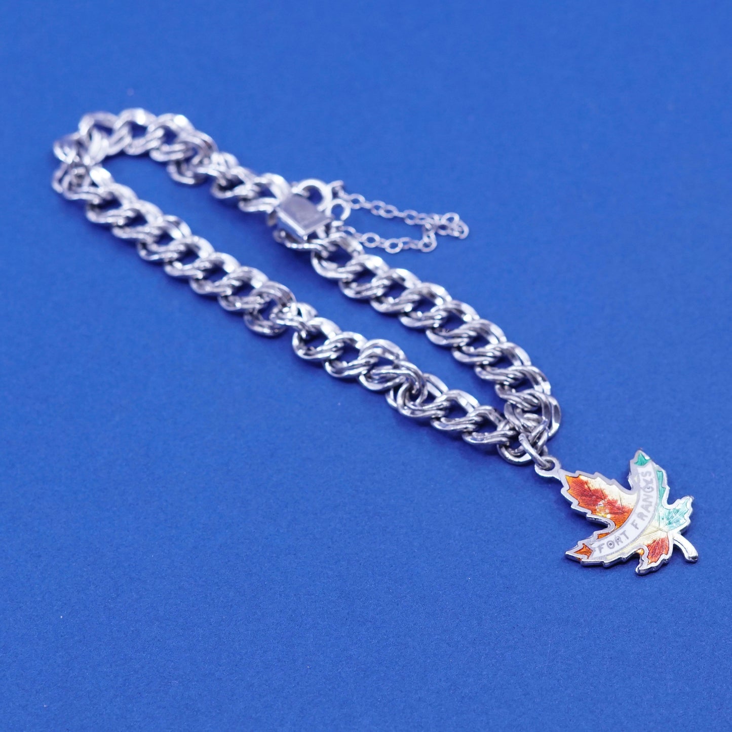 6.25”, Sterling silver bracelet, 925 double curb chain w/ Canada maple charm