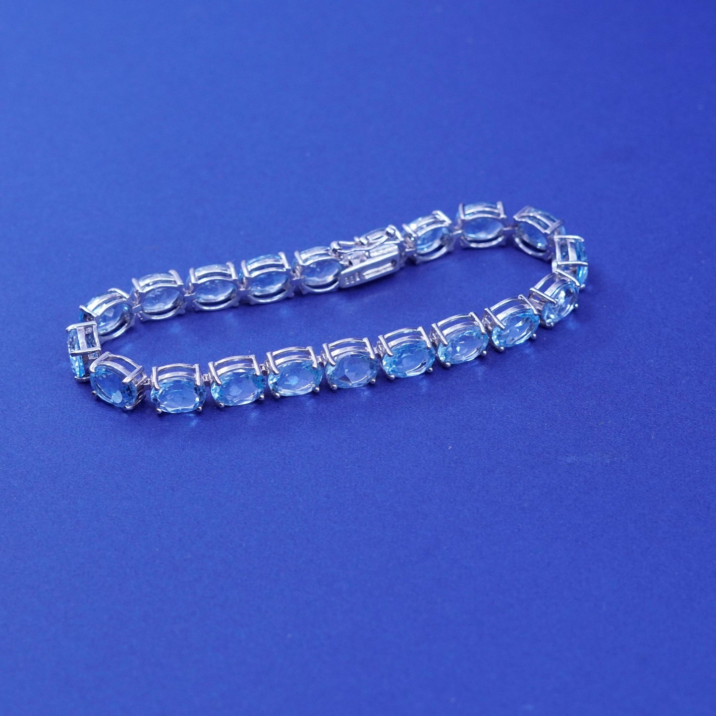 7.25”, vintage Sterling 925 silver tennis bracelet with topaz