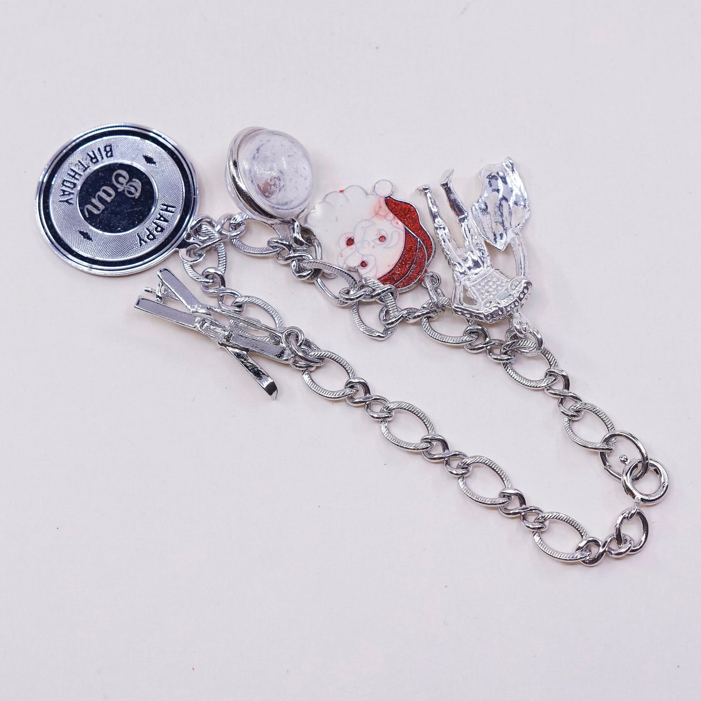 6.75”, vtg sterling 925 silver figaro, handmade bracelet w/ satan, matador, ski