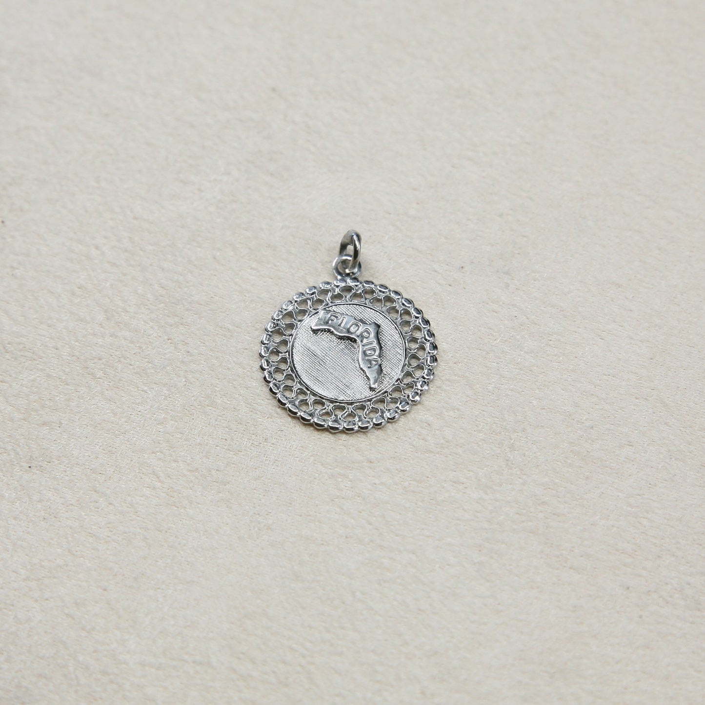 VTG ABC tdmpu 79 sterling handmade traveler pendant, 925 silver Florida state tag