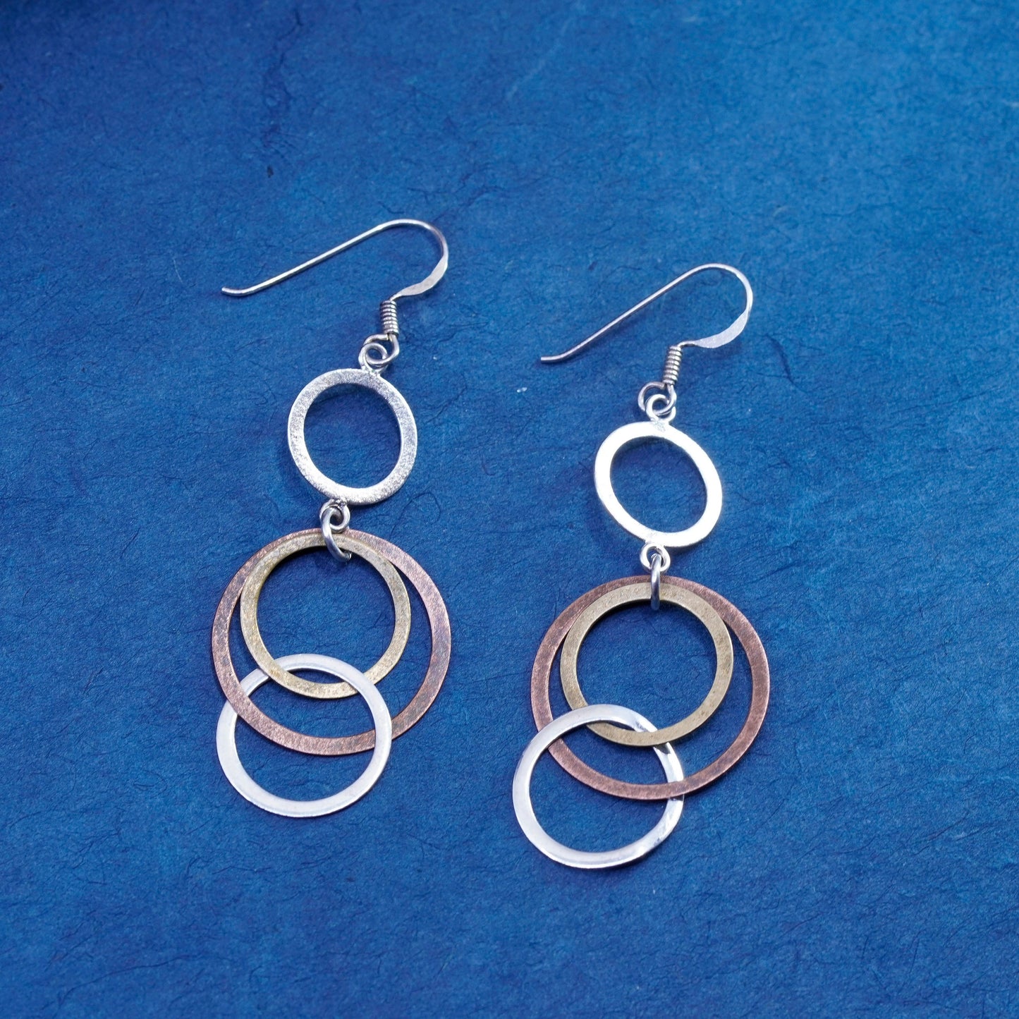 Vintage Sterling Silver handmade Earrings. 925 entwined flatten circle dangles