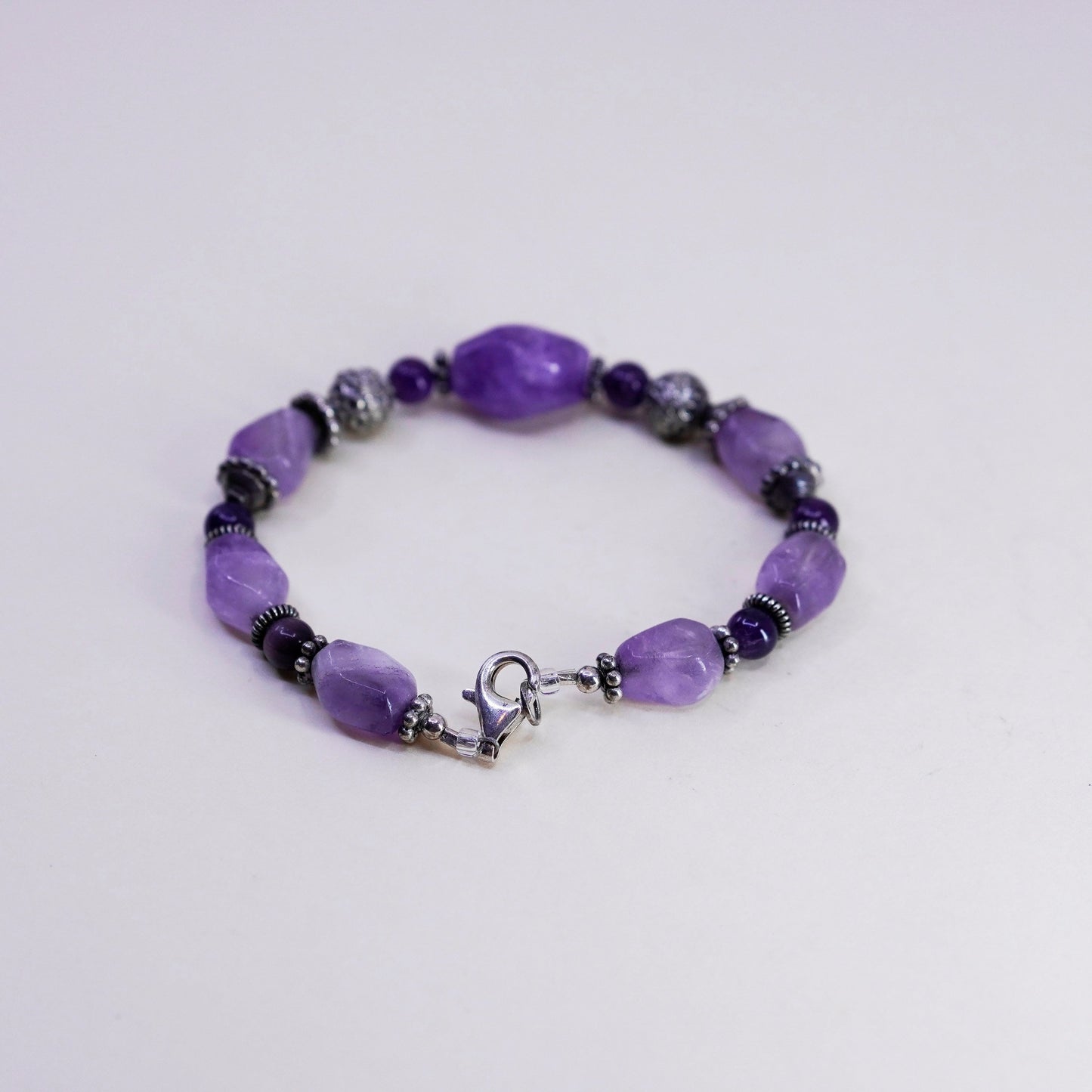 7.25” Sterling silver handmade bracelet, amethyst nuggets tiger eye beads