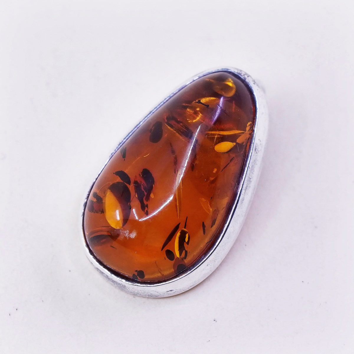 Vintage sterling 925 silver handmade pendant with teardrop amber