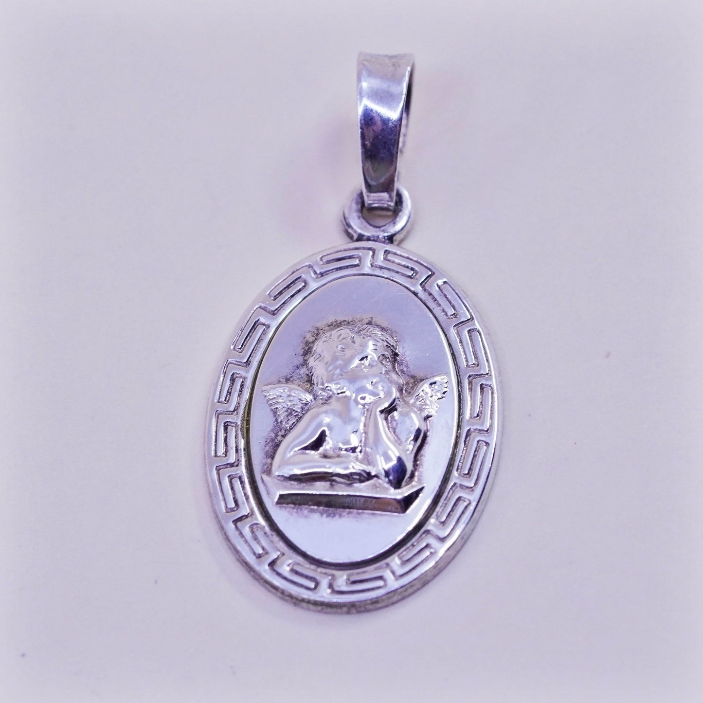 Vintage Sterling 925 silver handmade angel pendant with Greek key around