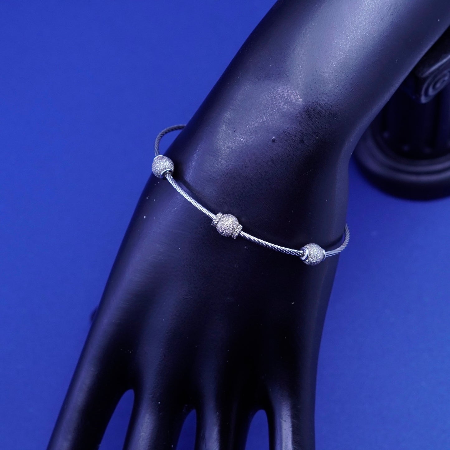 7”, stainless steel cable bracelet with Sterling 925 silver glittering beads