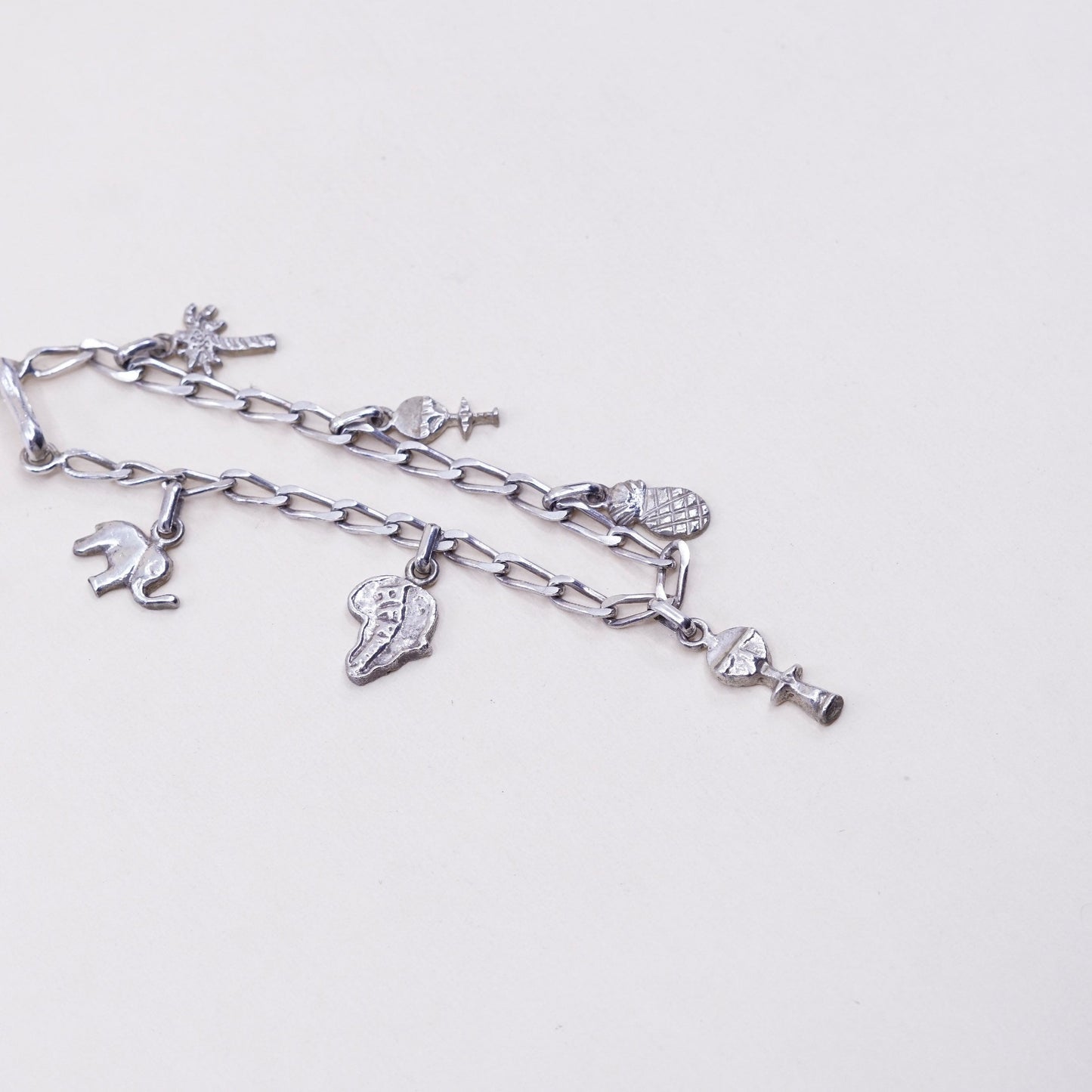 7”,, sterling 925 silver curb bracelet w/ palm tree pineapple elephant charms