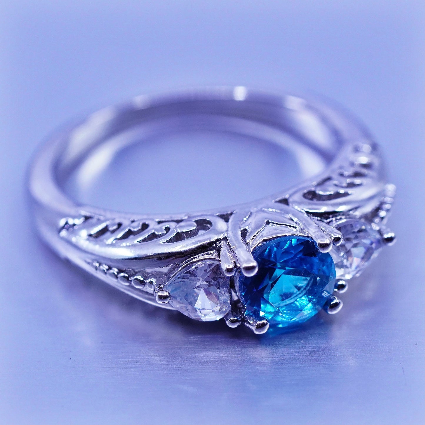 Size 7.75, vintage Sterling 925 silver handmade filigree ring with blue Cz