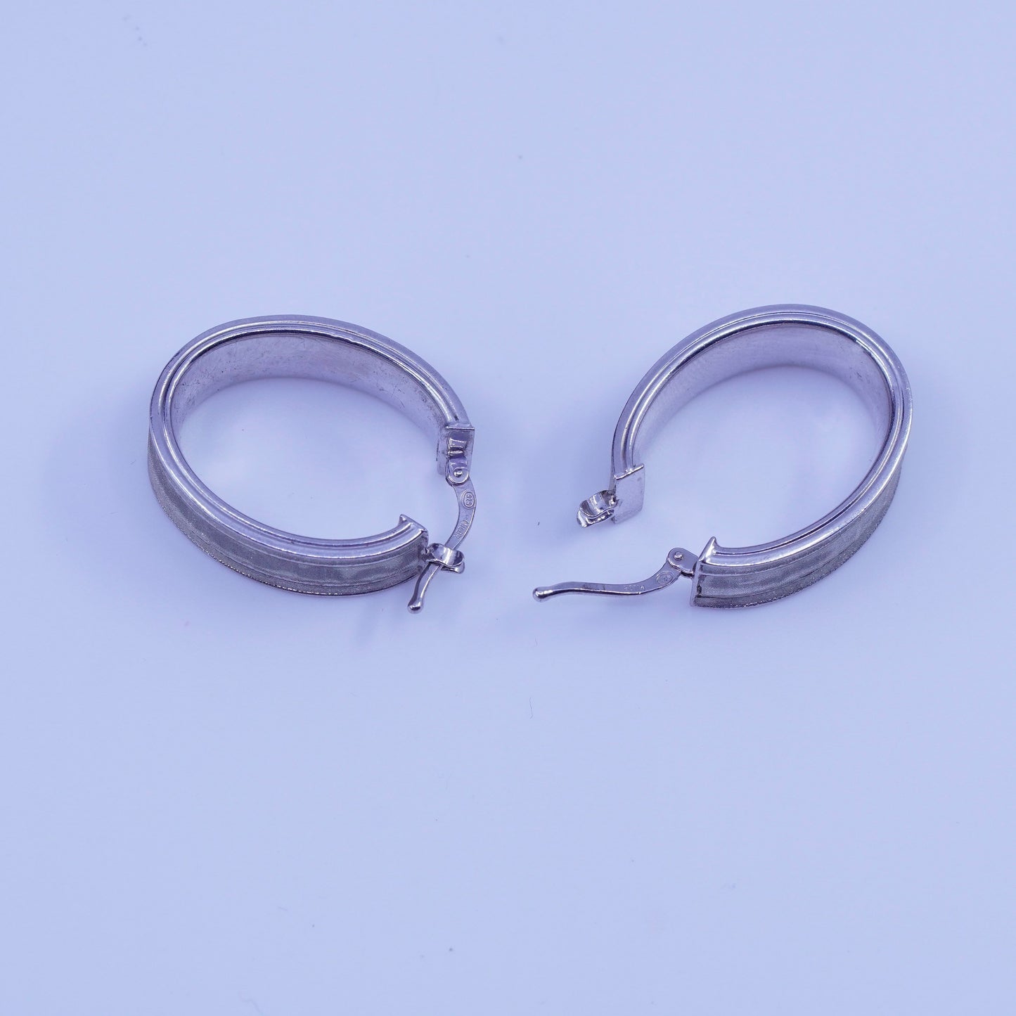1.25”, vtg Sterling silver handmade earrings, oval 925 matte glittering hoops