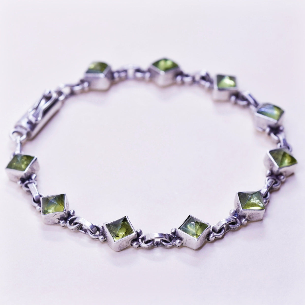 7.25”, Vintage Sterling 925 silver handmade bracelet with diamond cut peridot