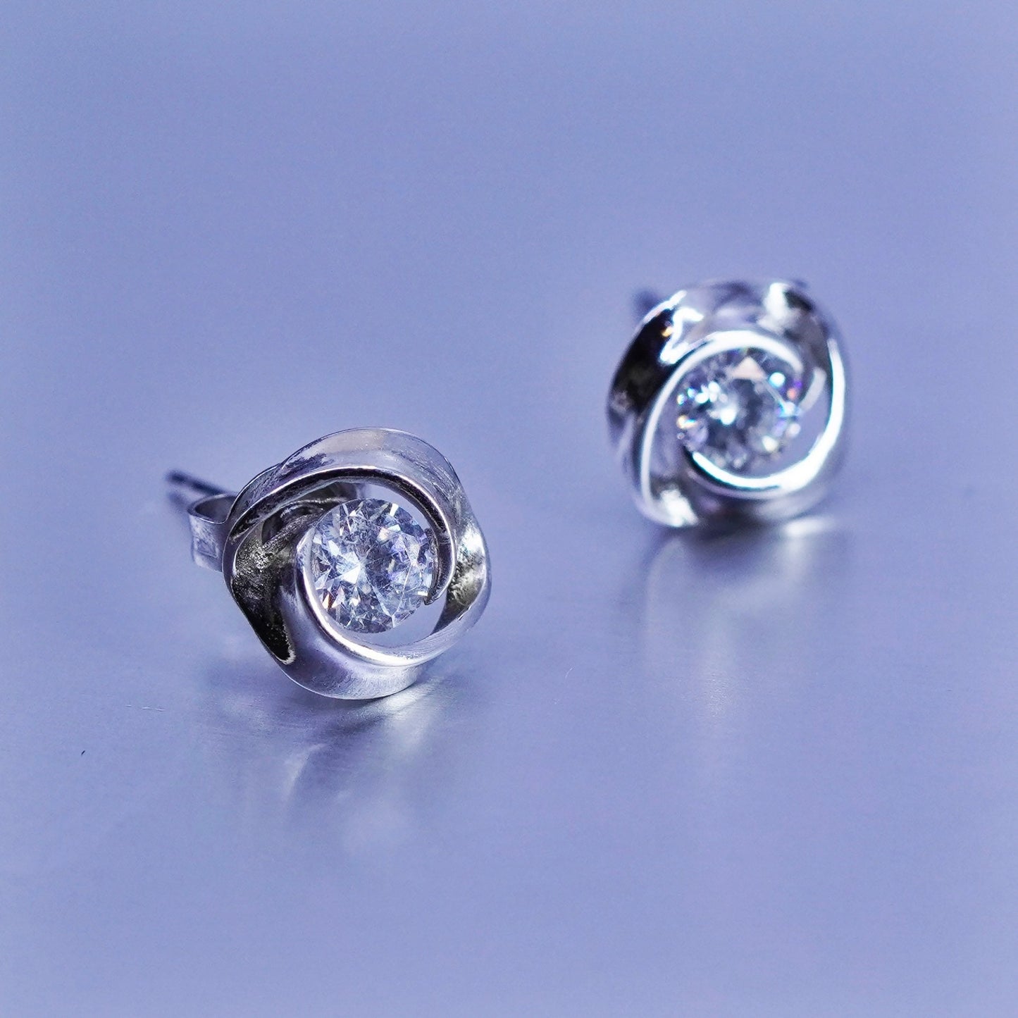 Vintage Sterling 925 silver earrings, entwined studs with cz inlay