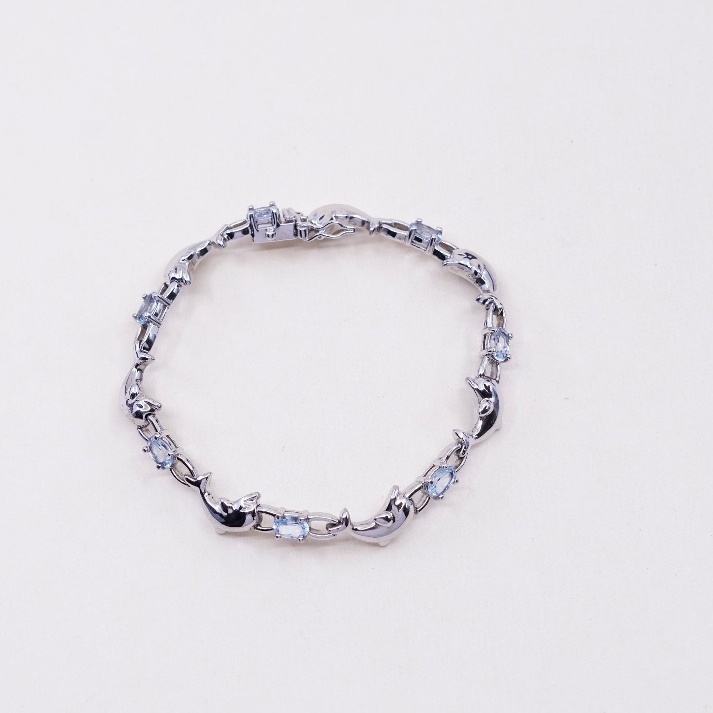 7.25”, vintage Sterling silver handmade bracelet, 925 dolphin links with topaz